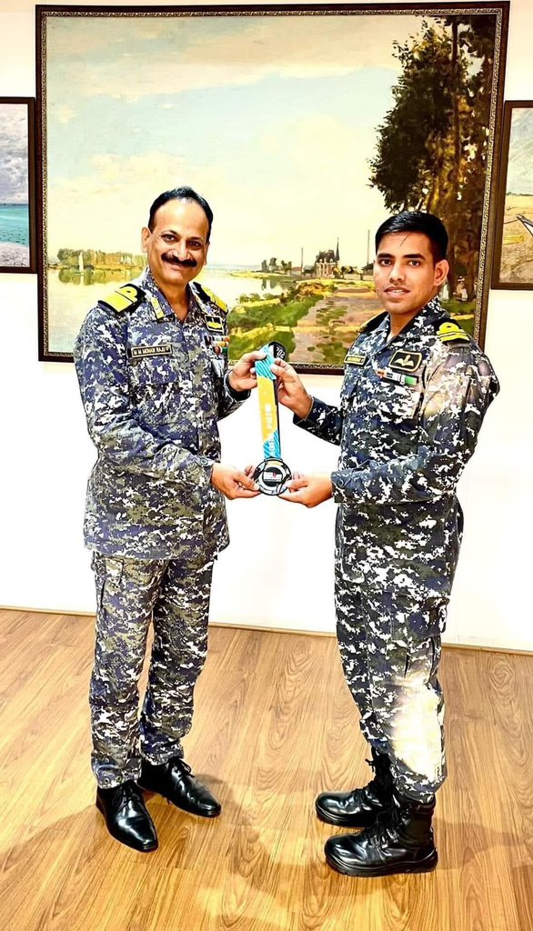 thejatculture's tweet photo. Lieutenant Commander Vipin Sheoran a #NavalPilot from #INSDega was felicitated by Rear Admiral M Murli Mohan Raju, #CSO(P&A) #ENC for completing the world's toughest Triathlon Ironman.(1/3) https://t.co/PI7NLrCK65