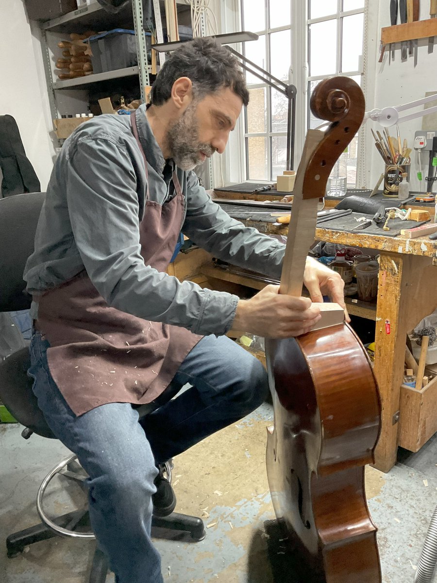 Here’s Massimiliano working on a neck graft to a cello that had its neck broken in an accident. #repair #accident #lutherie