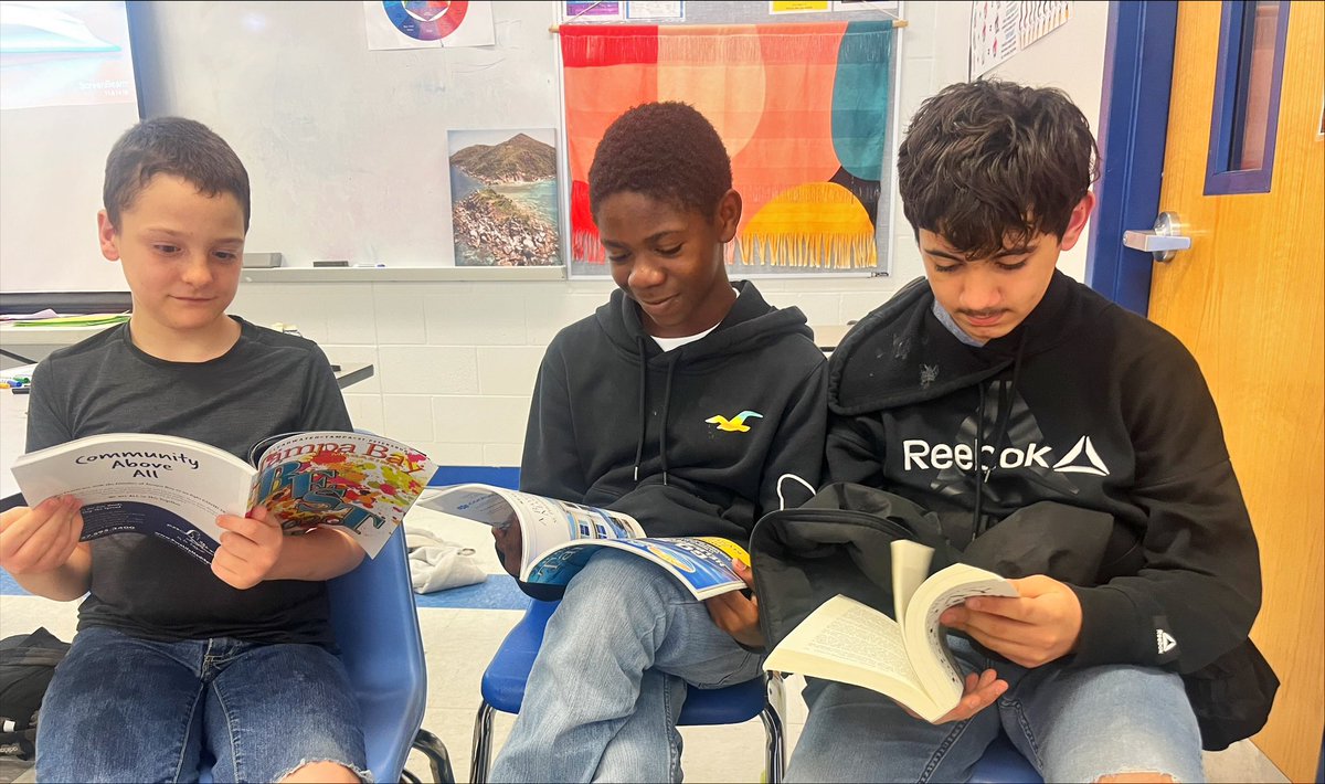 Dimitri, Jaden, and Darion reading in Art with Ms. Kirkland! #soarabove <a href="/PascoLiteracy/">Pasco Literacy</a> #pascocelebratesliteracyweek24