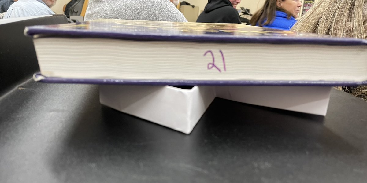 Teachers had to work together to build a structure out of paper and tape that would support the weight of a text book. #PortraitOfAnEagle #EaglesAreProblemSolvers