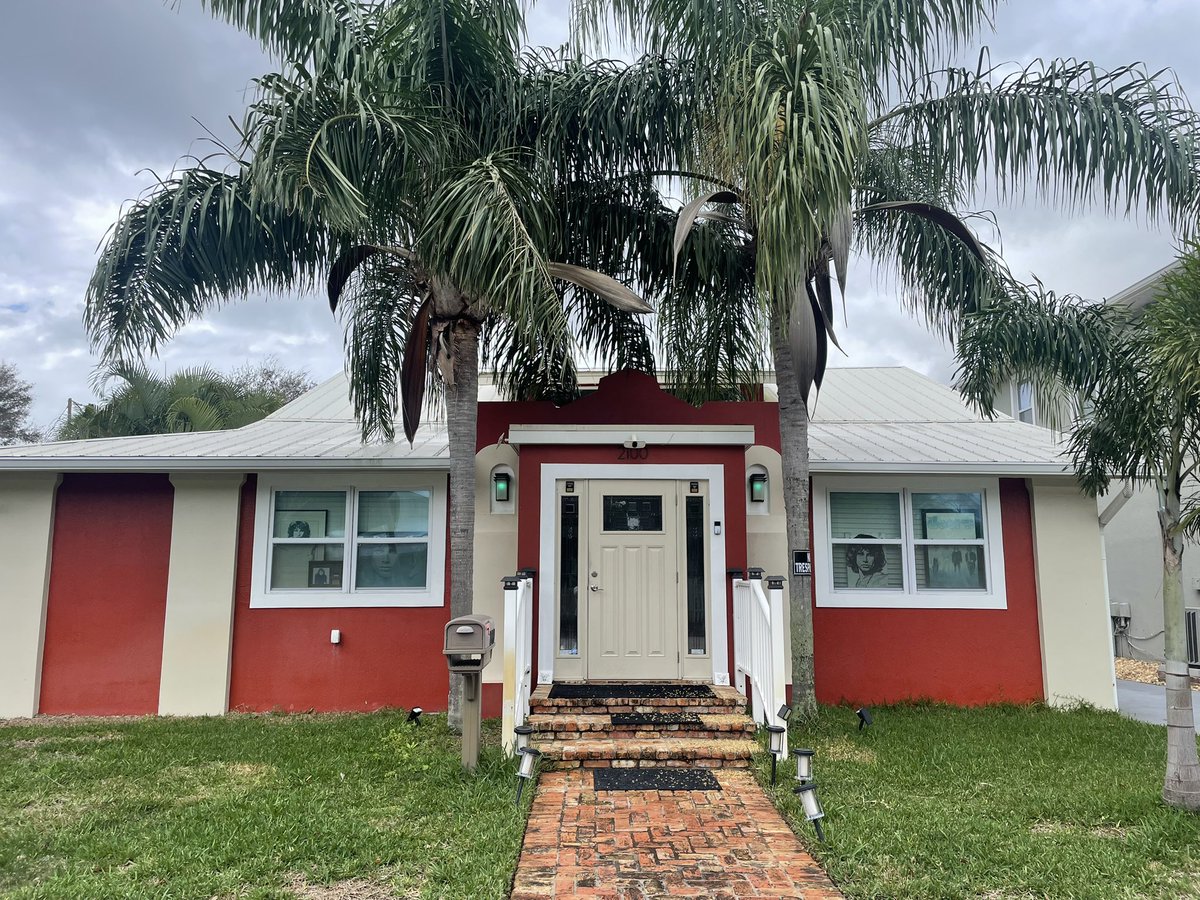 Today’s strange travel discovery as I roam all over Florida: The birth home of a famous rock star. (Clue in window.)