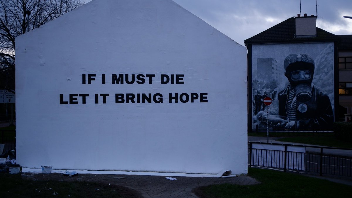 New message on Free Derry Corner as this year's Bloody Sunday commemoration  events show solidarity with Palestine., image size:1200x675