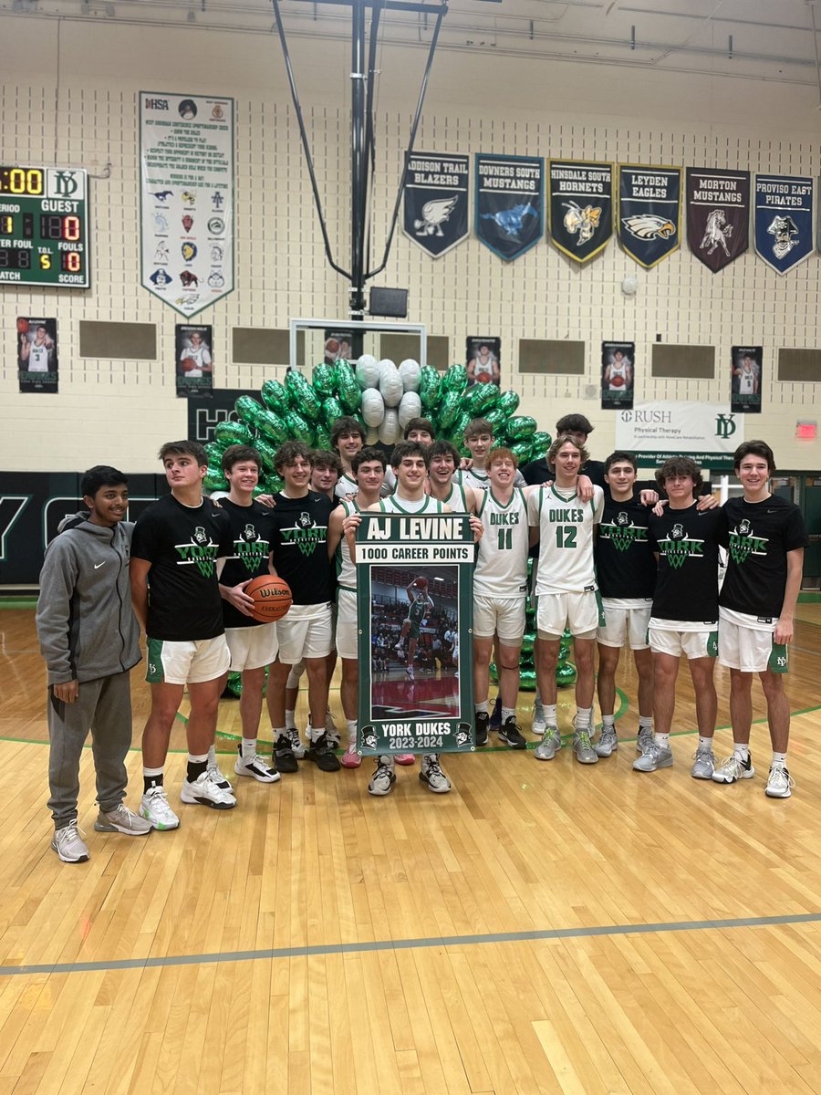 Congrats to AJ Levine scored his 1000 career point versus Huntley High School at MLK Day of Hoops! This is a remarkable achievement in AJ high school career. 💚🏀💚