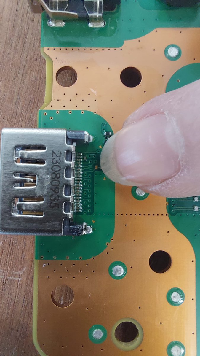 hannahmakes's tweet photo. Hand soldered my first 0201 component today! A teeny capacitor on a PS5 HDMI

I knew the husband would *love* a PS5 for xmas but we didn't have that kinda money, so I learned to repair them

Got a cheap broken unit, repaired it and gifted it...now I can't stop😅😂 
#RightToRepair https://t.co/Ij2Lxl9P1n