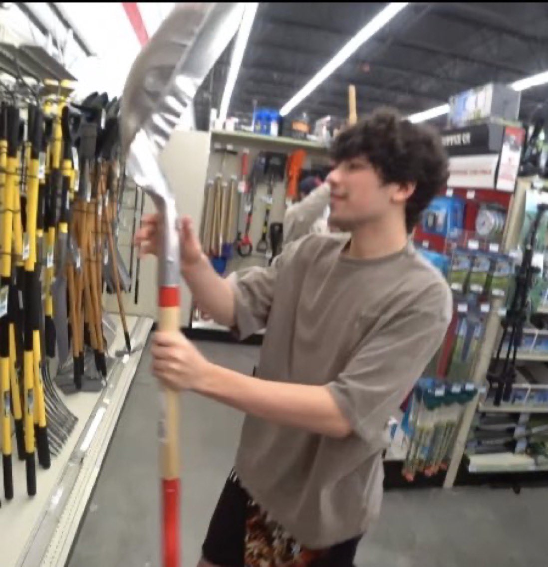 george holding a teaspoon