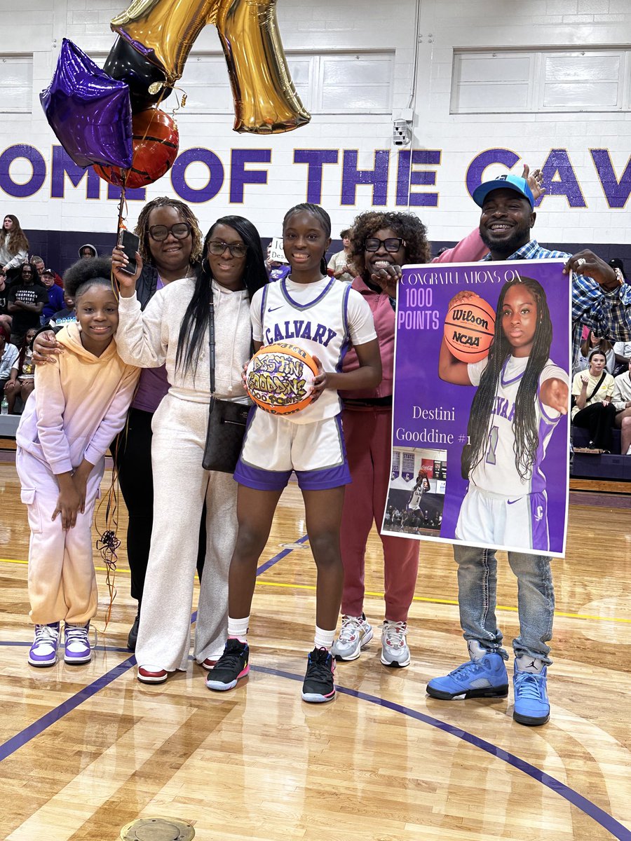 Destini Gooddine with her family at Calvary’s Tippett Gym after reaching 1,000 point milestone for her career. ⁦@Cavalier_Sports⁩ ⁦@DGooddine⁩ ⁦@KyleSandy355⁩