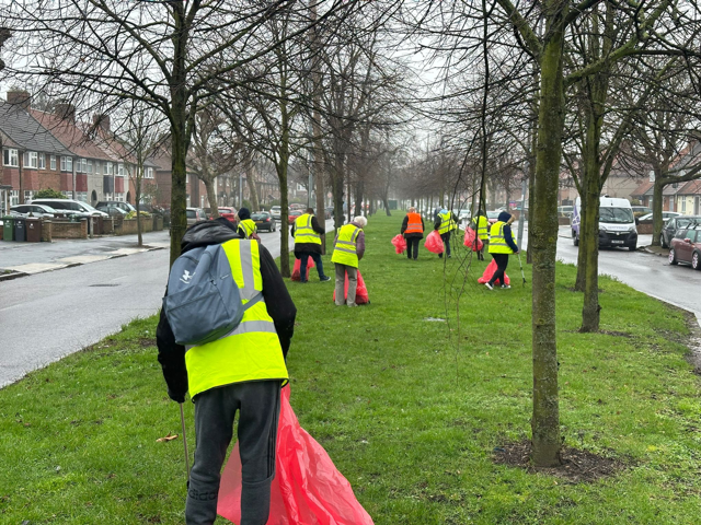 An action picture. Volunteers in the rain litter picking. 20 people turned up wow! Councillor Jane Jones and Syed Ghani featured too! Met four volunteers for the next one! Community Win. #community