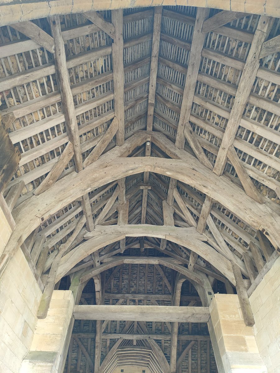 Fossilbeetle's tweet photo. Here is the tithe barn roof, Bradford on Avon. 14th century cruck roof https://t.co/69FNTzsWs4