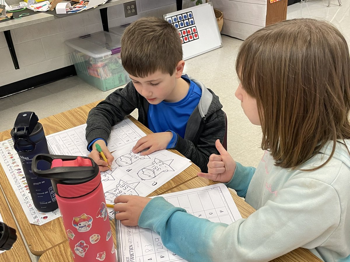 While collaborating to solve math equations, this student used “silent signals” from Number Talk to agree with her partner’s strategy. Awesome teamwork to solve more challenging problems!! <a href="/BGESTEM/">Ball Ground STEM Academy</a> #LOVEBGSTEM
