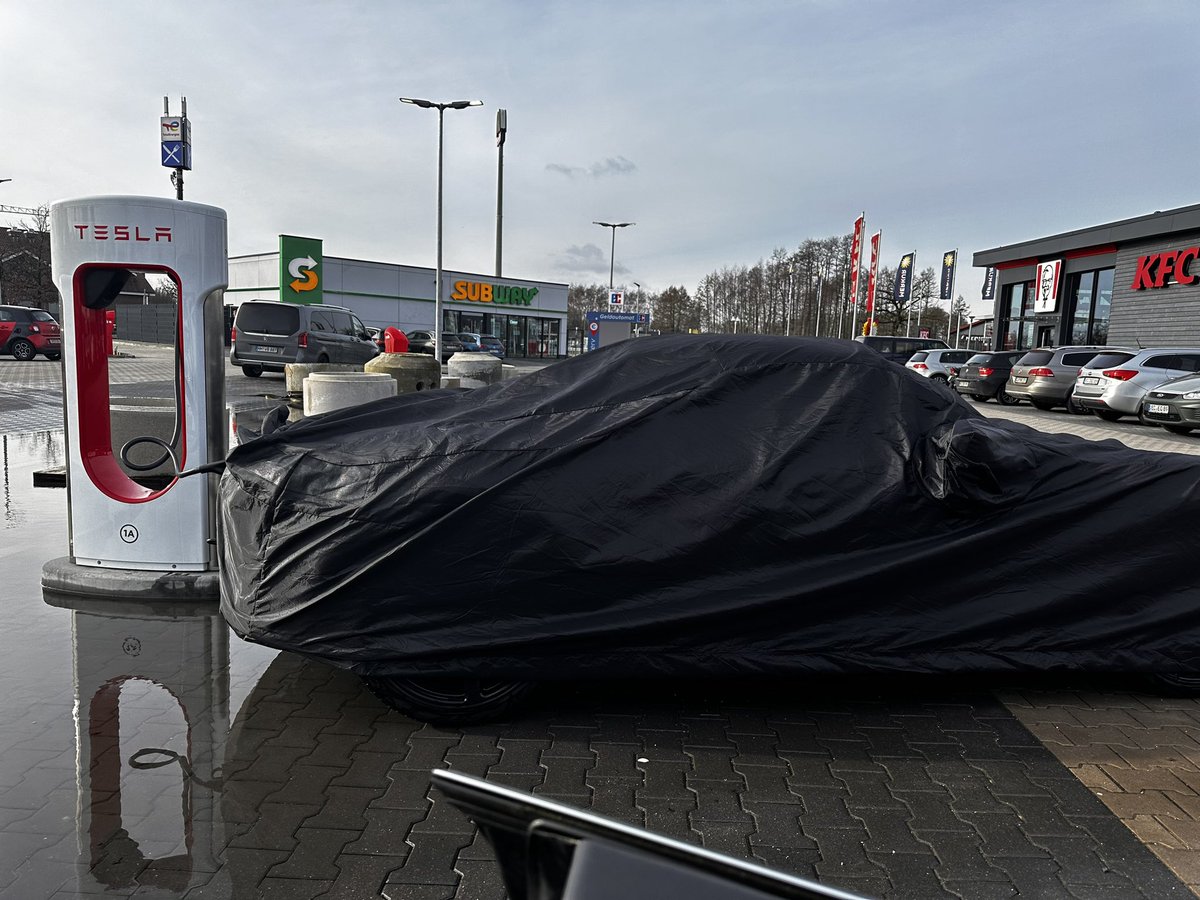 A pack of 5 Porsche 718/Boxter prototypes charging at Tesla supercharger Holdorf Germany.