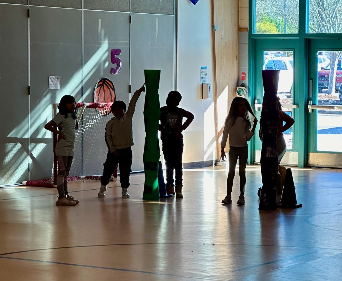 Students in PE used subitizing to have a GIANT cup-stacking race.  You can't tell from the photos, but the kids were jumping up and down with excitement!  #dualschool #PEclass