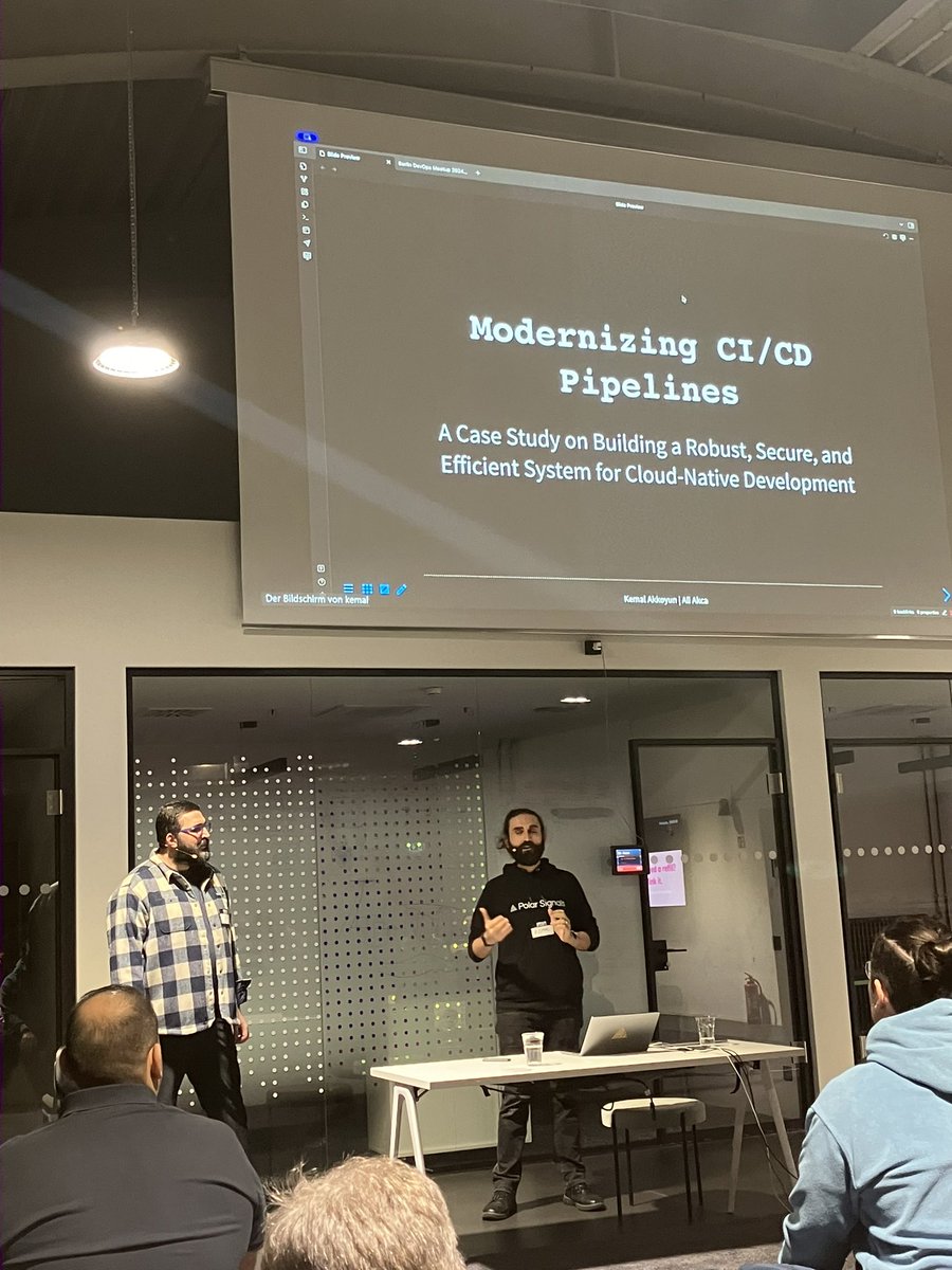 serdaroncode's tweet photo. Watching @kkakkoyun and @sameoldaweris presenting at @blndevops meetup at @traderepublic #DevOps #Devopsberlin https://t.co/JcQWUOBrAY