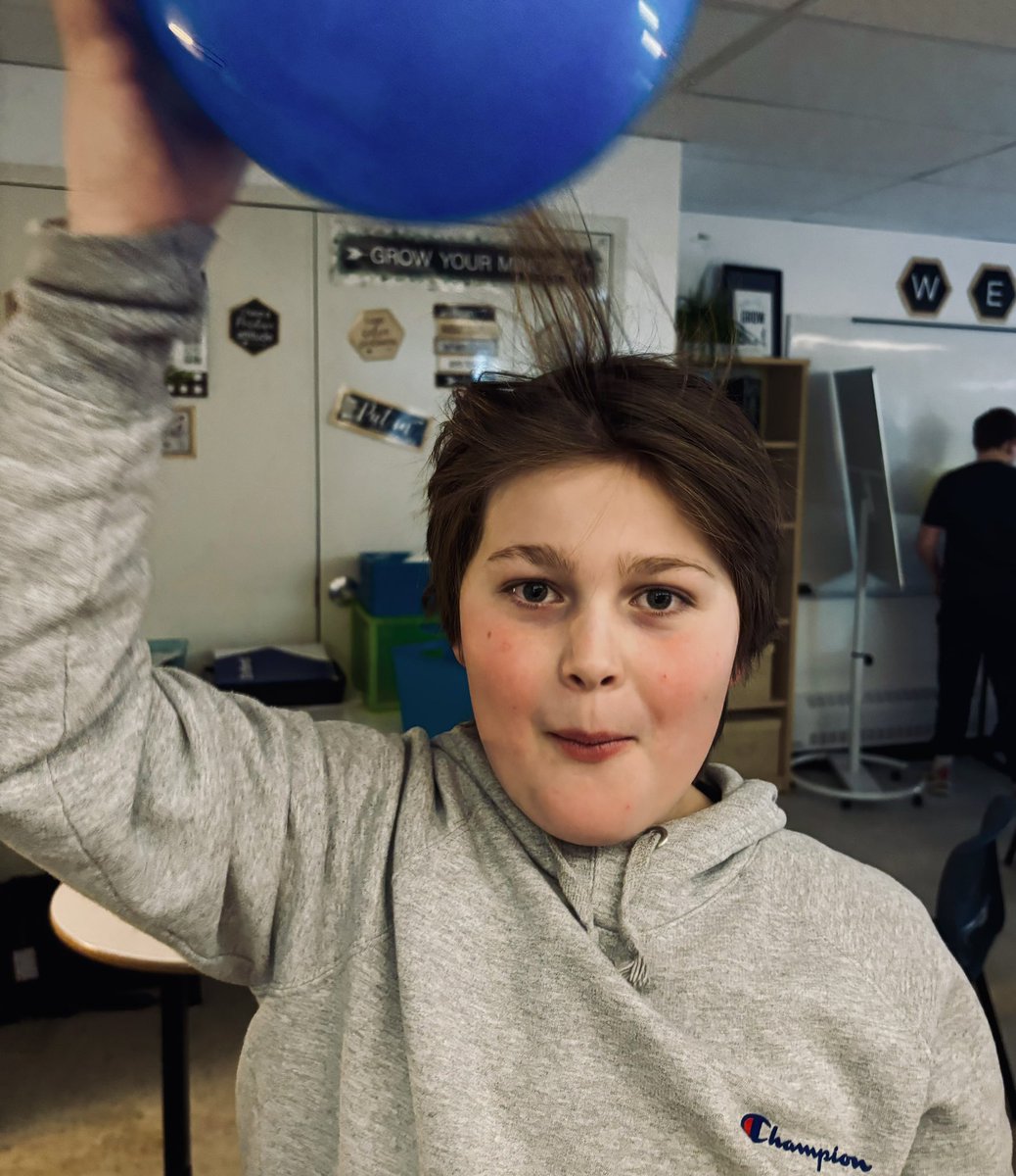 RobynBent79's tweet photo. We explored how friction causes electrons to jump creating a negative charge. And because opposite charges attract…there were many bad hair days in 604 today @GPVanierJH. https://t.co/PZtYi2pG6m