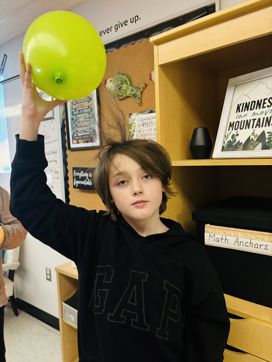 RobynBent79's tweet photo. We explored how friction causes electrons to jump creating a negative charge. And because opposite charges attract…there were many bad hair days in 604 today @GPVanierJH. https://t.co/PZtYi2pG6m