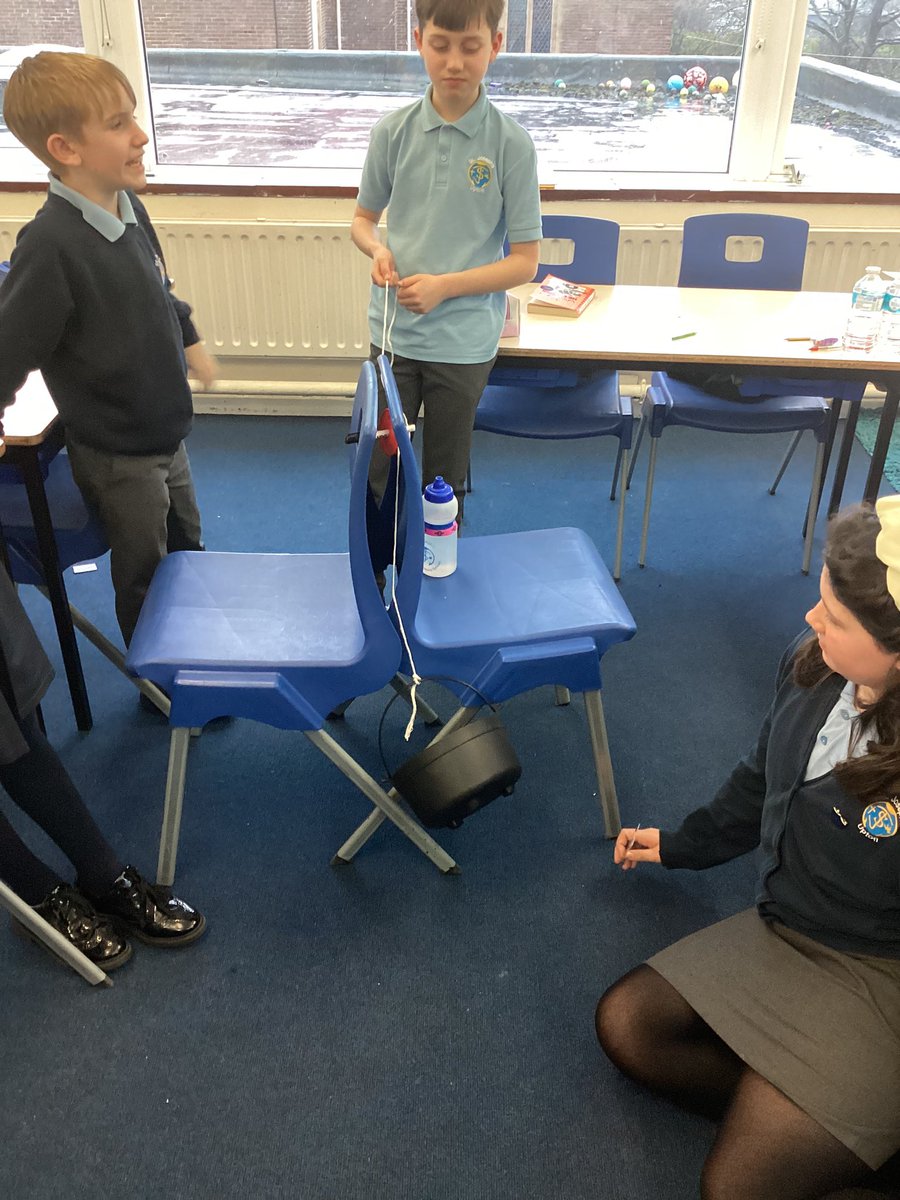 StJosephU's tweet photo. 6F have been investigating pulley systems this afternoon. They were given different challenges which all involved transporting a bucket using a pulley and had to work as a team to find a solution. #SJUDT https://t.co/SKGcmbeLR6