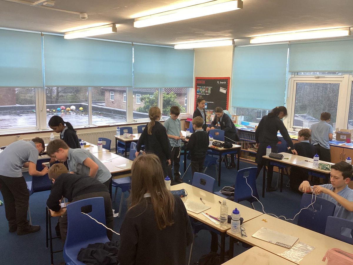 StJosephU's tweet photo. 6F have been investigating pulley systems this afternoon. They were given different challenges which all involved transporting a bucket using a pulley and had to work as a team to find a solution. #SJUDT https://t.co/SKGcmbeLR6