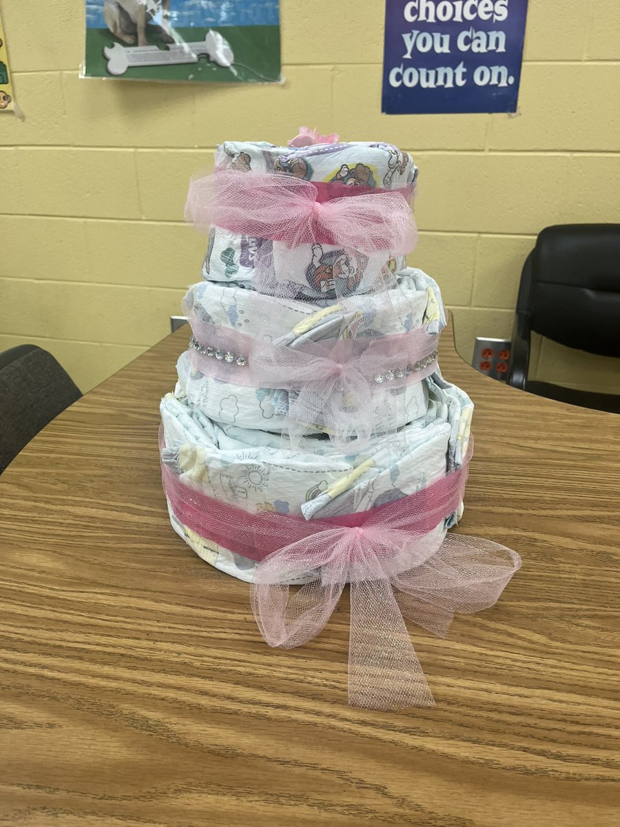 GileGina's tweet photo. What’s a diaper cake? Now you know! Child Development had fun creating diaper cakes for our Teacher Guest Speaker tomorrow. Is it a boy or girl? @SocasteeHS https://t.co/D3ckKGHVme