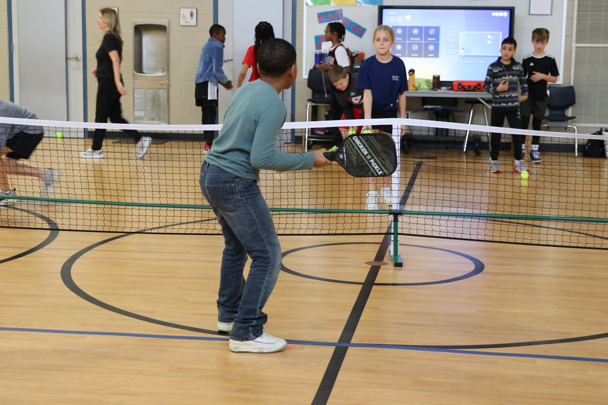 Thank you to our community partner, @ChickenNPickle, for bringing the fun of pickleball to our @GESStars students. During PE, Coach Basil and the guest coaches used pickleball to help students improve their hand-eye coordination and cardio. #WeAreGCISD