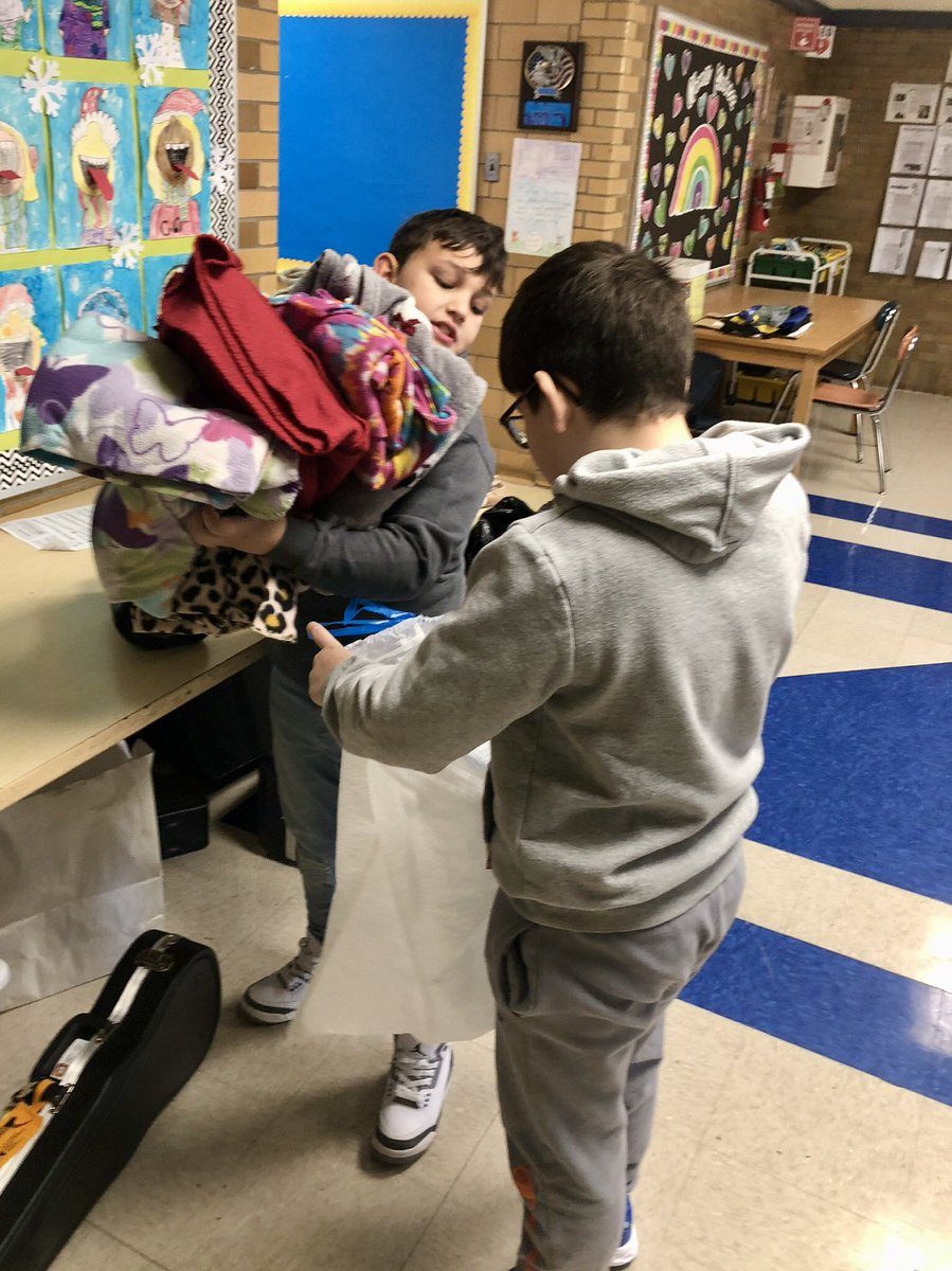 Sorting blankets and towels for our animal shelter donation drive!