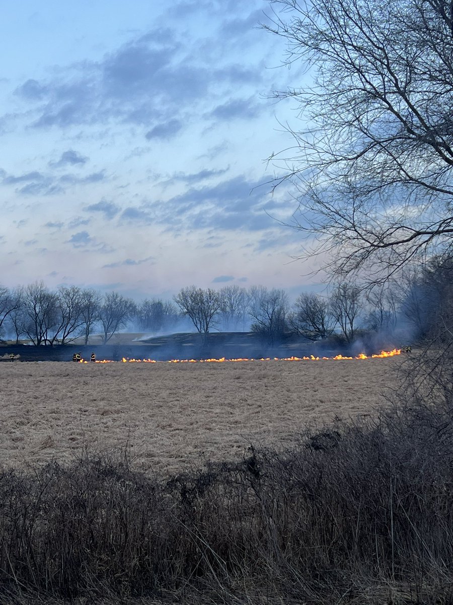 LakemoorPD's tweet photo. Brush Fire to the West of Morris Ct. MCFD is on scene and advised no concerns to the neighborhood. Cause is unknown, possibly lightning. 

Parking and driveway access will be limited in the 670-690 block of Morris Ct. https://t.co/oJ4ceWMmlG