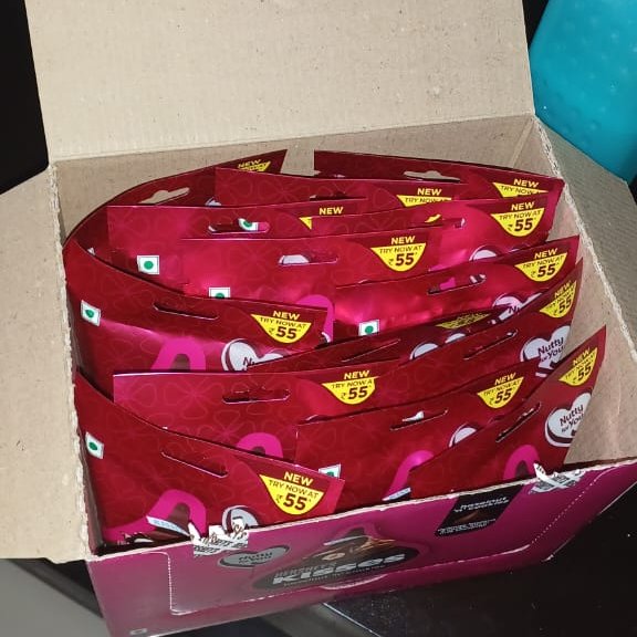 StNiggamon's tweet photo. Yo @SwiggyInstamart , thanks for the the Chocolate Day present of a ton of Hershey' Kisses sampler. I am pretty sure someone at one of your dark stores goofed up and sent me the whole carton instead of just one, but it made my day brighter. https://t.co/o4y1vIqemL