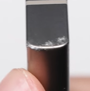 LeakerApple's tweet image. This is why Apple uses Grade 5 titanium. Samsung saved costs by using Grade 2 and the difference is noticeable.