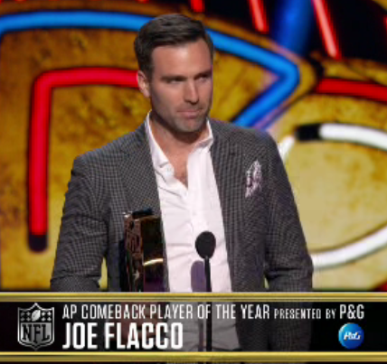 MarkWJZ's tweet photo. Can't make this stuff up.
6 yrs after Lamar Jackson took Joe Flacco's spot as Ravens starting QB, the 2 are on the NFL award stage. 
Flacco as "Comeback Player of the Year" with CLE and Jackson as "MVP" (2nd time) 👍👍@wjz @WJZ13sports https://t.co/ro4xMo1Ih6