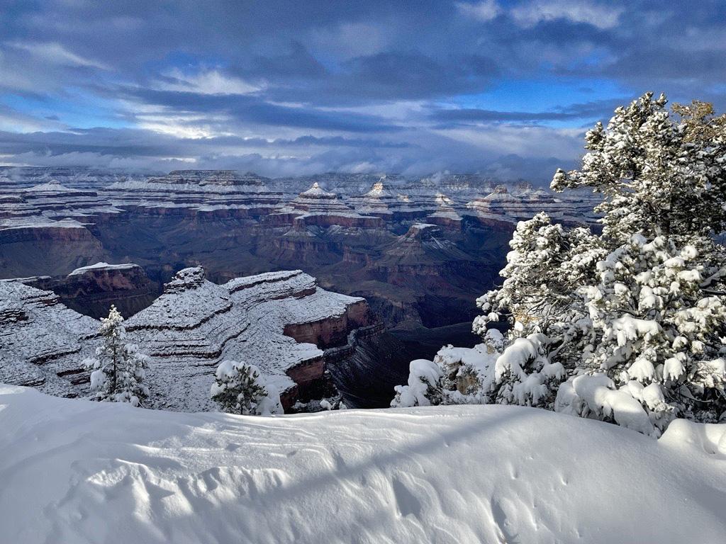 Winter storm clearing along the Canyon Rim Trail — Thursday afternoon, Feb. 8, 2024. After a break Friday morning, another storm system moves in Friday afternoon, and into Saturday. Drier weather will return by Sunday with warming temperatures next week. 📷NPS/C. Kraus