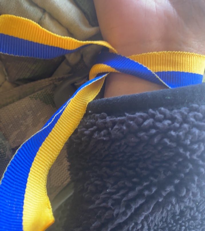 Gia_Santos_'s tweet photo. When I stepped off the bus yesterday, I was greeted by a Ukrainian young man who placed this ribbon on my hand with the Ukrainian flag colors. #WelcometoUkraine 🇺🇦 https://t.co/3tkgSTdImD
