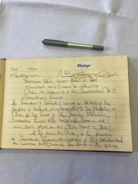 PresidentIRL's tweet photo. President Higgins this week visited @ChileinIreland and signed the Book of Condolences for Sebastián Piñera, former President of Chile, and expressed his sympathies for the victims of forest fires in Valparaiso. The President has also written to Chile's President @GabrielBoric https://t.co/C9IT4J8GEA