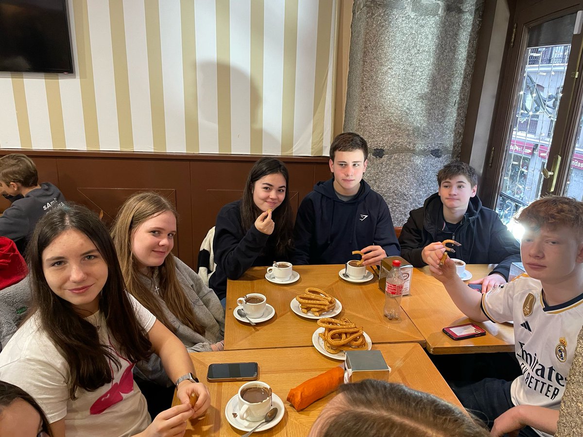 GiggLanguages's tweet photo. The school day started with the raising of the flag ceremony and then it was off to enjoy some churros con chocolate @giggschool https://t.co/e4GL9wMoRF