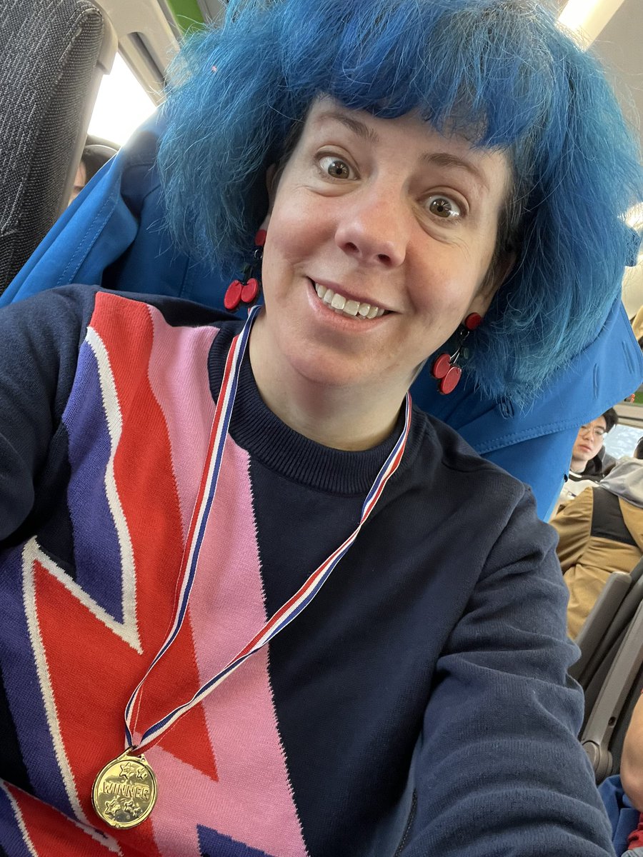 SarahVaci's tweet photo. Littlest gave me a medal for all the stress and effort getting ready for our outing. #mumbling 

Is my jumper more Bowie or Flash Gordon? https://t.co/K63HBTvSyC