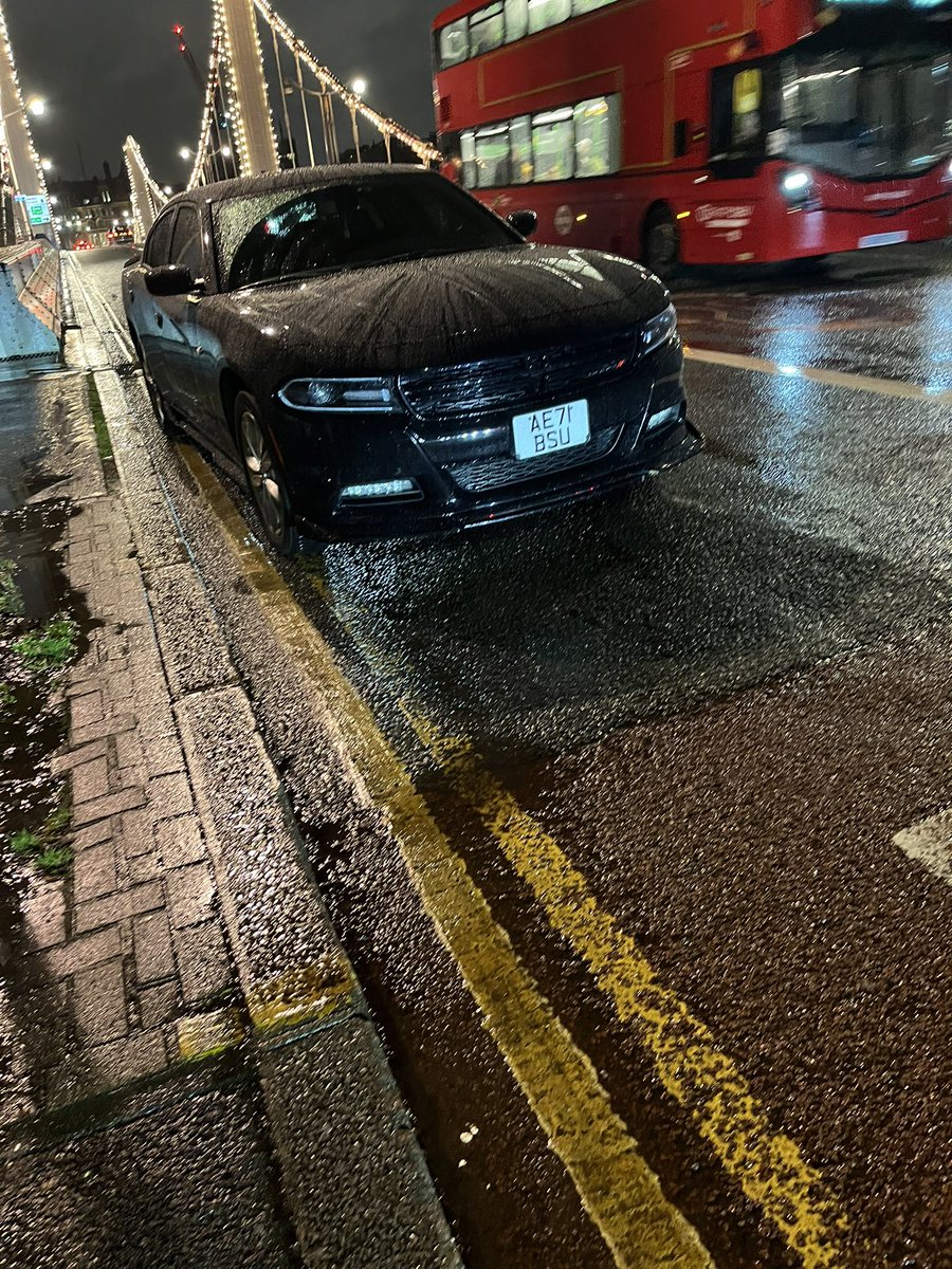 tele_text's tweet photo. @TfL @metpoliceuk @MPSWandsworth @wandbc Why is this car allowed to park regularly after 7:00 pm on Chelsea Bridge on double yellow lines next to a bus stop on the wrong side of the road  in the northbound lane whilst facing south, crossing a white line to get there? @YPLAC https://t.co/3EjSQfqTpk