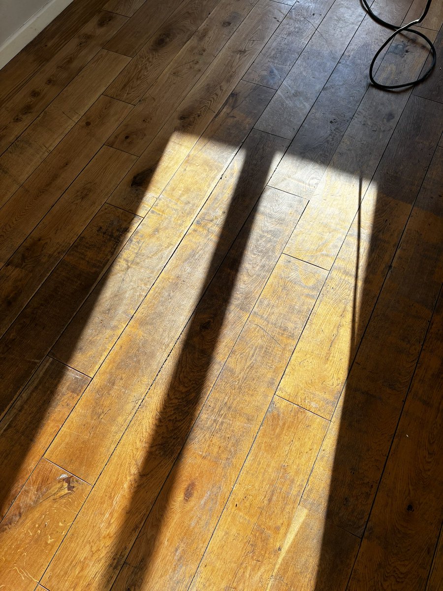 Floor restored, this solid oak floor was in real need of sanding and sealing - the team at AHF sanded back to bare wood before finishing with Diamond Oil Active Sand Grey from WOCA Denmark - a finish that can last a life time with the correct care and maintenance