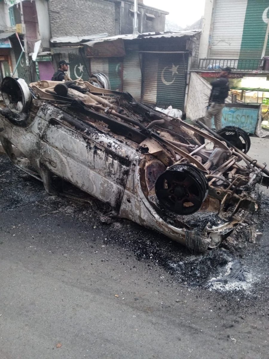 HamzaAzhrSalam's tweet photo. Aftermath: PTI workers burned police cars in Shangla. #NA11 https://t.co/PIboFNanvL