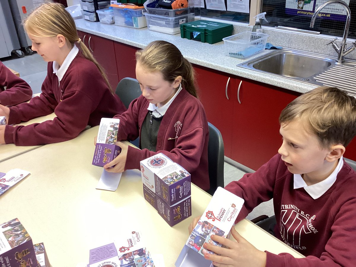 Holytrinityrc's tweet photo. The Pupil Chaplains were busy at lunch time today making Caritas collection boxes for all the children in the school. We hope you can give generously during Lent for those in need. @SalfordDiocese #caritas #lentencharity #givingalms https://t.co/MIz0HKMeDS
