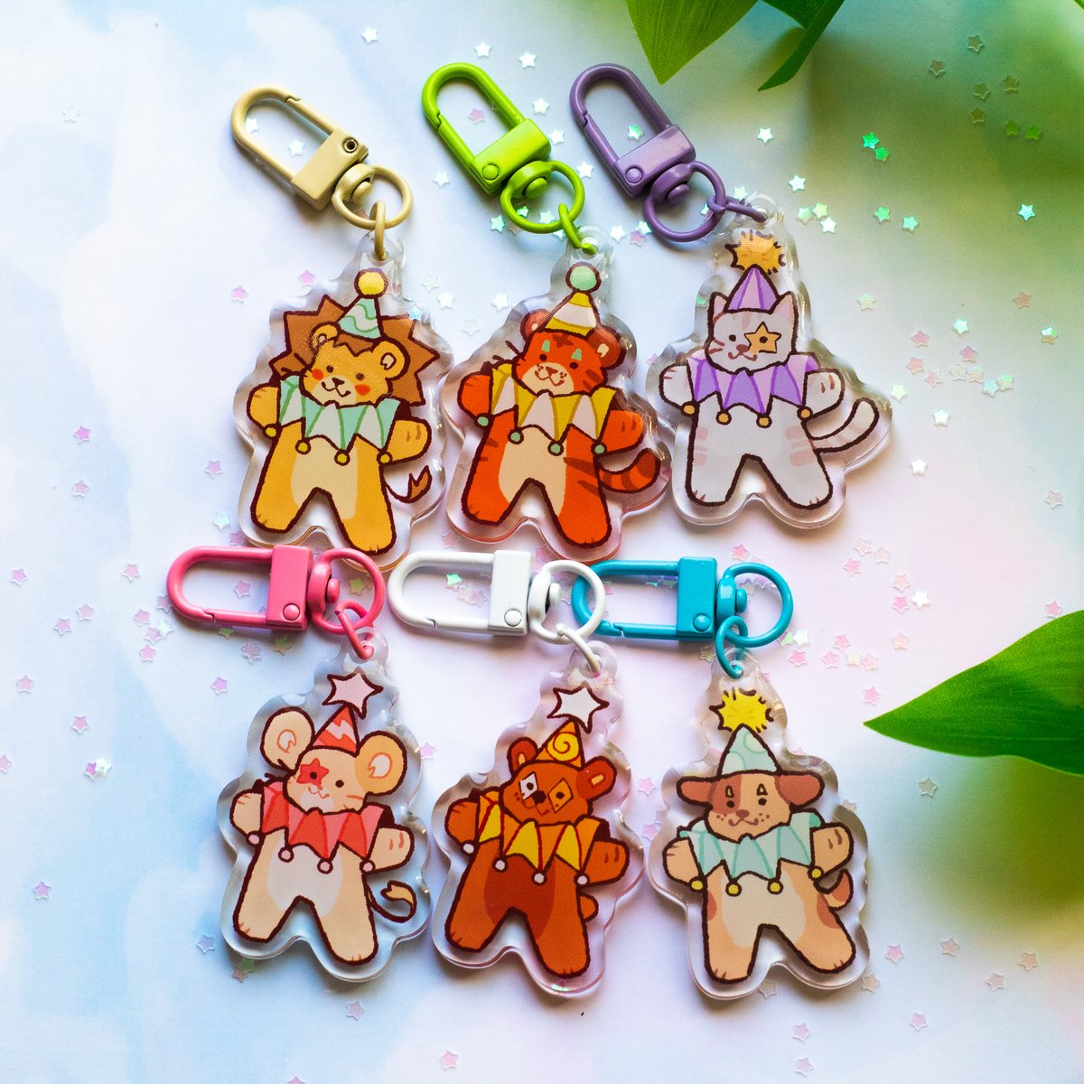 tigers_tooth's tweet photo. hey you 🫵 pre0rders close tonight for these products!! LED headlight bumper stickers AND clown pal keychains?? wow wow wow! https://t.co/bdQ2zETtVu