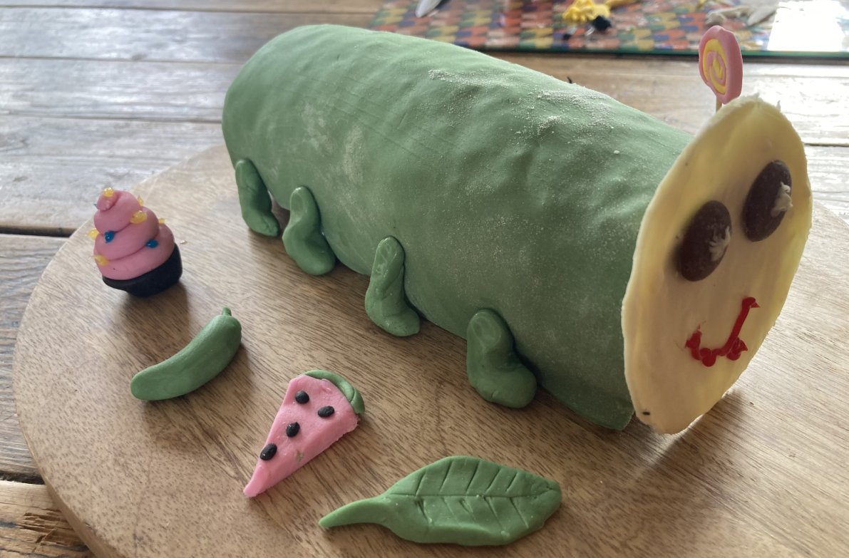 HartestSquirrel's tweet photo. Well done to Daisy for completed her Baking Badge for brownies. We think they look amazing Daisy! Below are two photos: One is a cake about sewing showing a hobby and the other is the Hungry Caterpillar showing a story @HartestPrimary https://t.co/53Ucw1TGWq