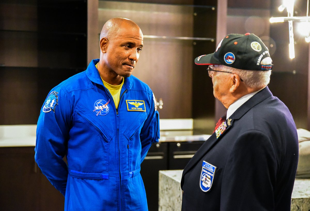 RocketCenterUSA's tweet image. We were honored to have NASA astronaut Victor Glover join us for the 30th anniversary of our Aviation Challenge® program. Victor, pictured here Tuskegee Airman Lt. Col. George Hardy, will be the first person of color to orbit the Moon when Artemis II takes place next year. #BHM