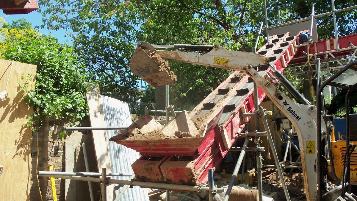 Our double electrical conveyor belts are handy for transporting solid materials from a dig site out to a nearby skip. #construction #UKConstruction #ConstructionUK #londonconstruction #buildinglondon #buildingahouse #builders #engineeringlife #UKEngineering #conveyorsystems