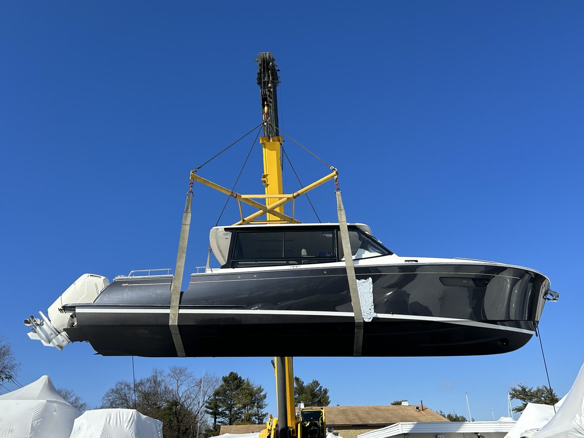 Just hanging around! A newly arrived MJM 4 in the slings today. Her new owner can’t wait to go for a ride. @MJMYachts #mjmyachts