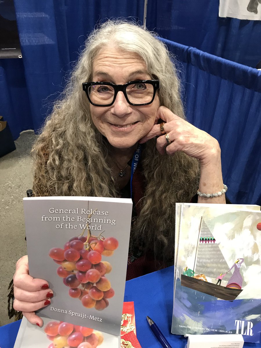 Me right now signing books at Tahoma Literary Review T1518! @AWP @TahomaReview until 2:00!! @parlorpress come by!!!