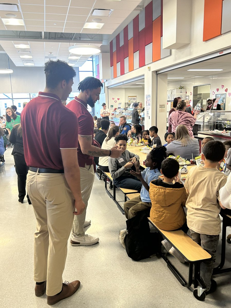 Great to see @LafColFootball players @DallasHolmes24 and @TyreeMorris12 giving back to the community. @Coach__Trox