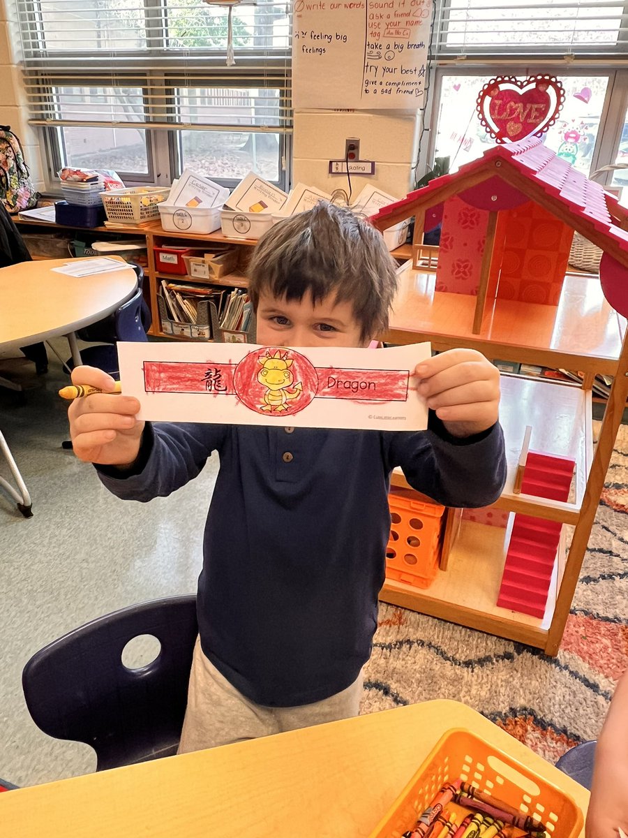 MsLeAACPS's tweet photo. Happy Lunar New Year! We learned about the horoscope and that 2024 is the year of the dragon! Students had fortune scratch offs and even learned a Vietnamese game that’s played to celebrate this time of year! It was so fun sharing my culture with my students! 🐉 @AACountySchools https://t.co/yplweWPySD