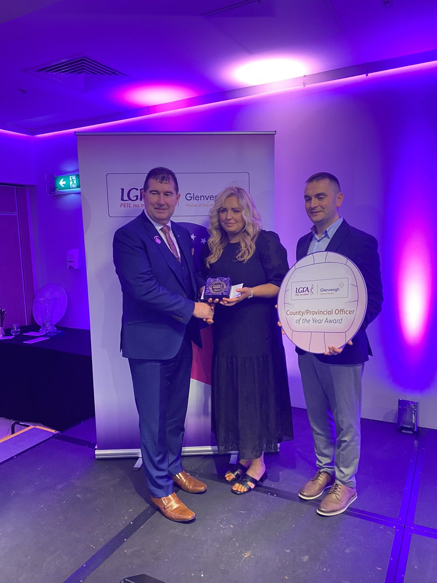 Lisa Walsh from county Cork is presented with the County / Provincial Officer of the Year award by Ladies Gaelic Football Association President, Mícheál Naughton, and Mr. Martin Clancy, Senior Marketing Manager, Glenveagh Homes, at the 2023 Glenveagh Homes LGFA National Volunteer…