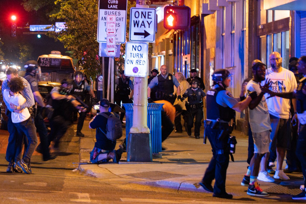 daviss's tweet photo. My photo of them being arrested, their attorney tells Star Tribune: "as part of the settlement approved 13-0 by the City Council Thursday, Mayor Jacob Frey will apologize in person to the men, their attorney said Friday." https://t.co/hgv6mN9vKr https://t.co/QCeaqvapG8