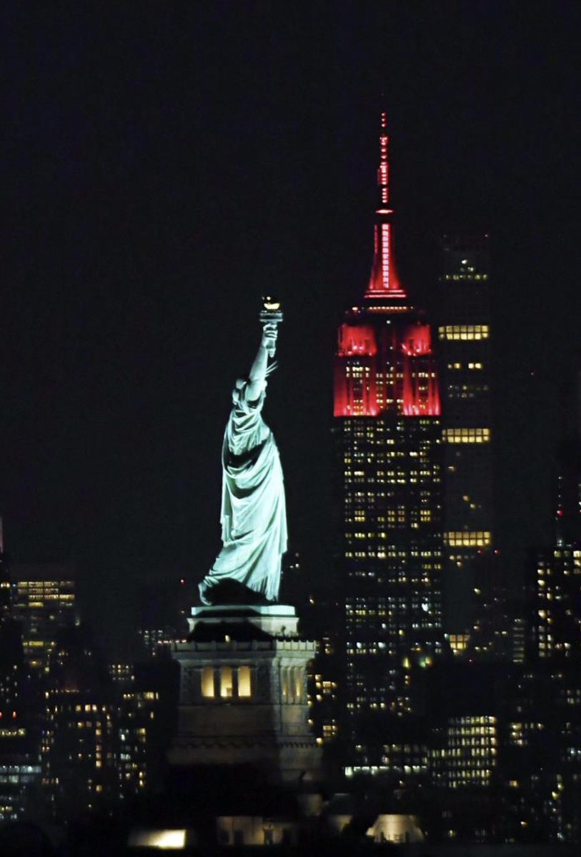 The Empire State Building in New York lights up in red for Chinese ...