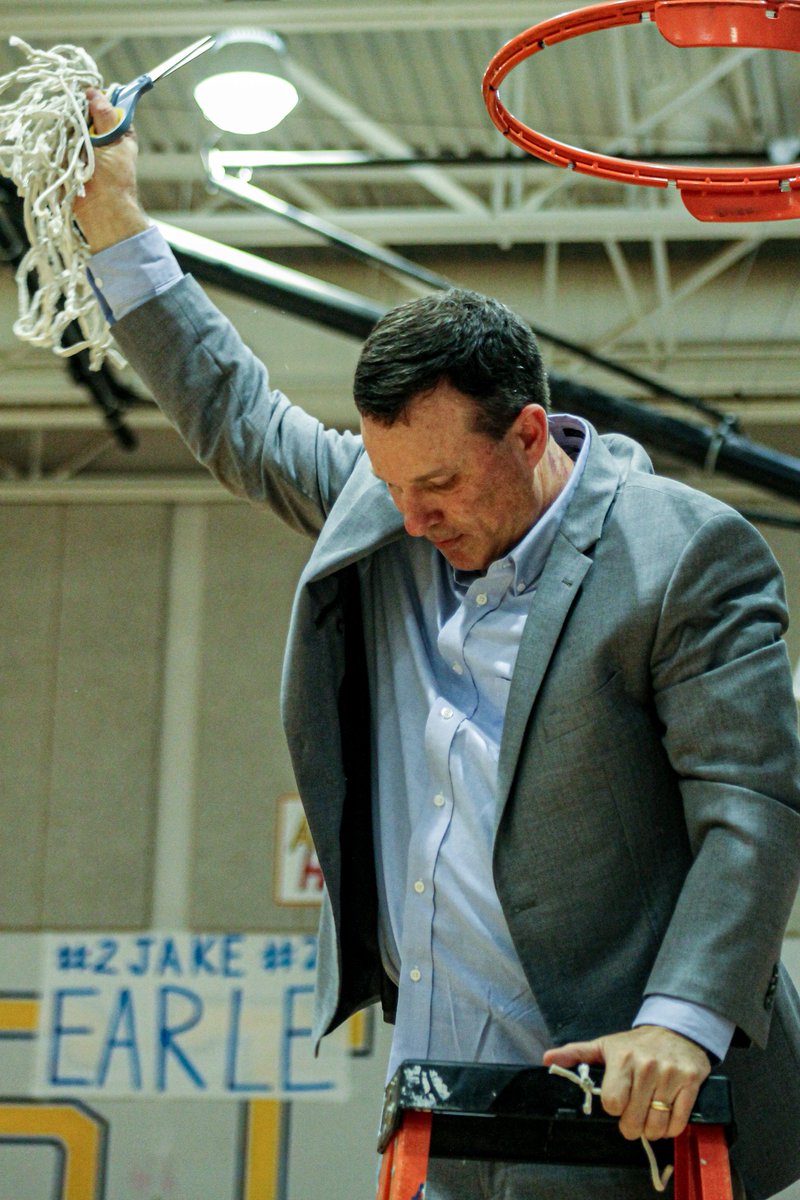 The best attire a coach can wear is a suit. The best accessory is a net in hand.