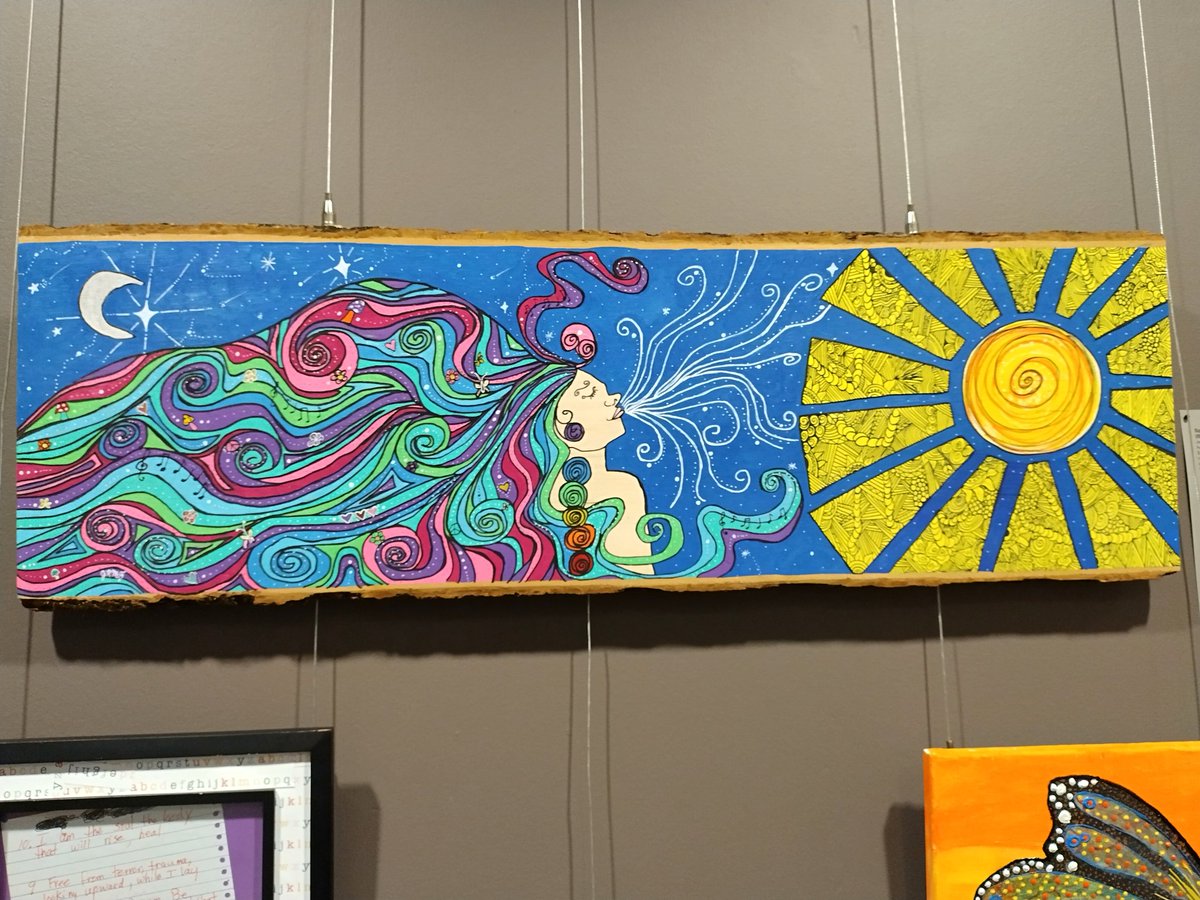 Celebrating my beautifully talented wife at the opening of the renewal art gallery featuring her piece "spiritus irae"