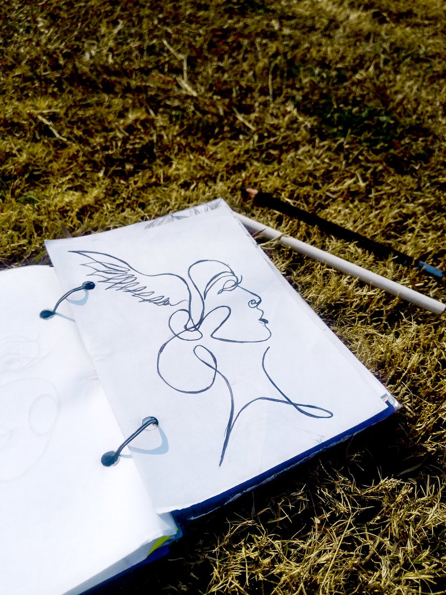 In ebony strokes and whispered ink,
A muse emerges, poised in link,
Where dreams take flight, a soul's ascent.Upon her brow, a wondrous sight,Wings of thought, ethereal light,
A crown of feathers, a halo of grace,A fusion of beauty and intellect's embrace.
#artist  #artwork
